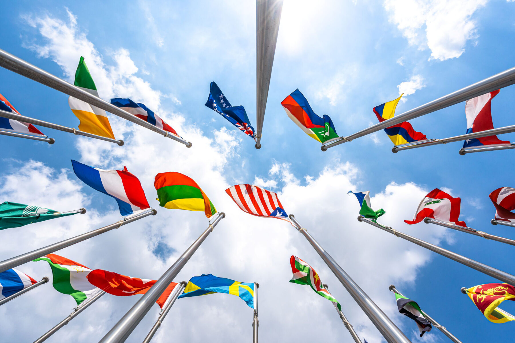 National flags with blue sky backdrop